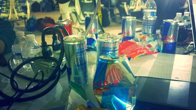 MHacks table, cluttered with redbull cans